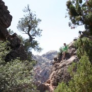 Nicholas sitting on rocks