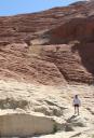 Nic and Mel climbing hill in red rock canyon