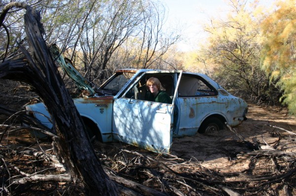 Nicholas checking out the driver's seat.  Comfortable, but could use a little upholstery work!